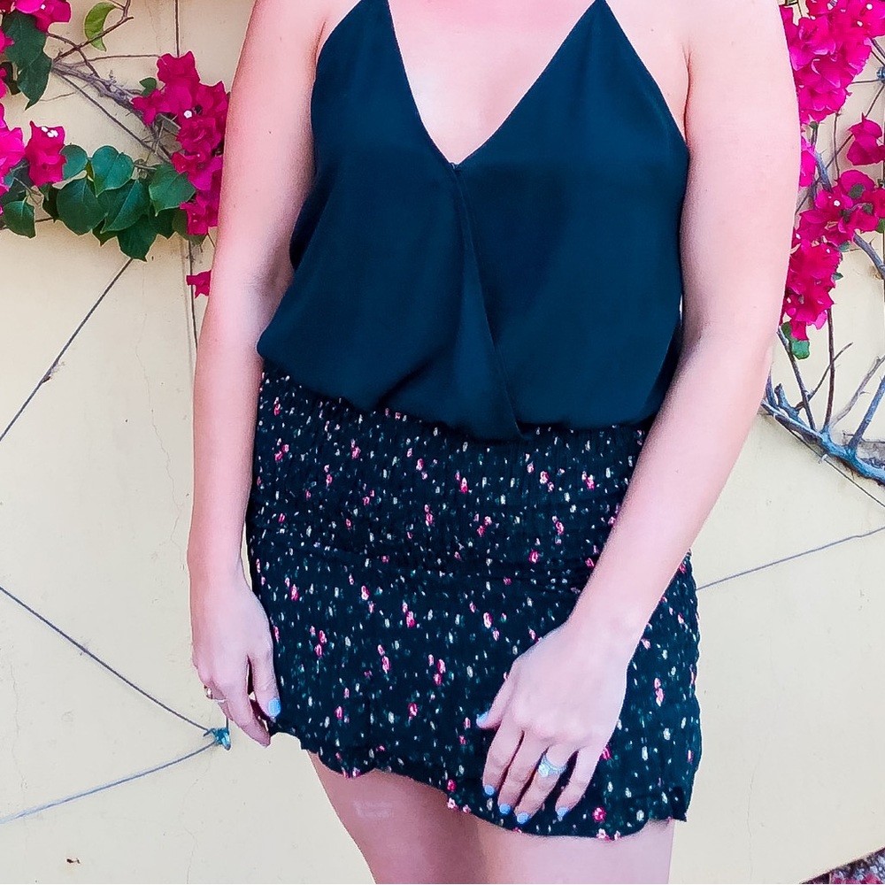 Black floral mini skirt